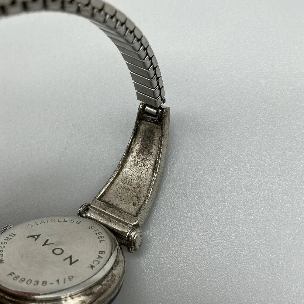 Avon F69038-1/P Women Watch 27mm Silver Tone Blue Bezel Stretch Band New Battery
